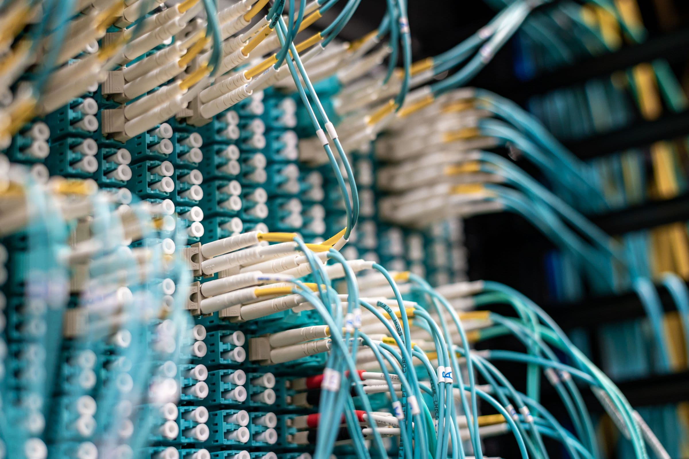 Structured network cabling terminated on a patch panel inside a switch cabinet